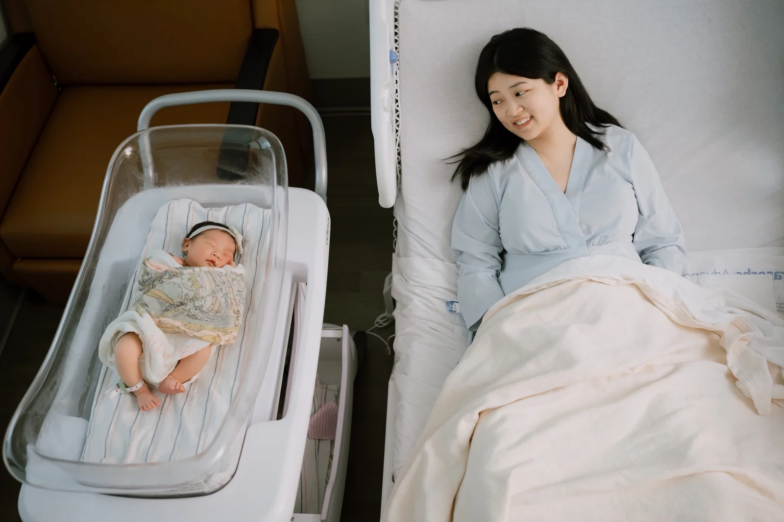 Expecting couple holding hands during a simple studio maternity session